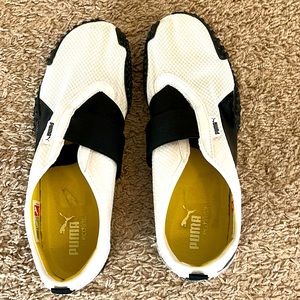 Black and white Puma sneakers, size 9.5